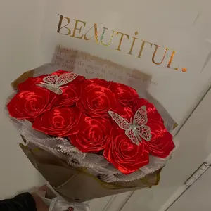 Red Satin Rose Bouquet with Elegant Butterfly Accents for Special Occasions and Gift Giving