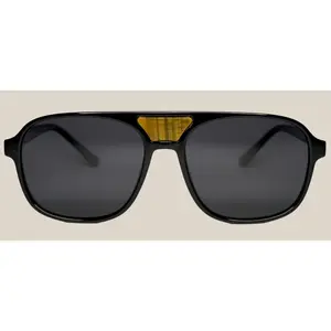 The "Karma" frames are nested with unique natural crystals. Black frames with Polarized sunglass lenses. Size: 54-16-145