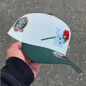 9FORTY New York Yankees 1999 World Series Side Patch Cap – Green & White, adjustable size, white LA logo.