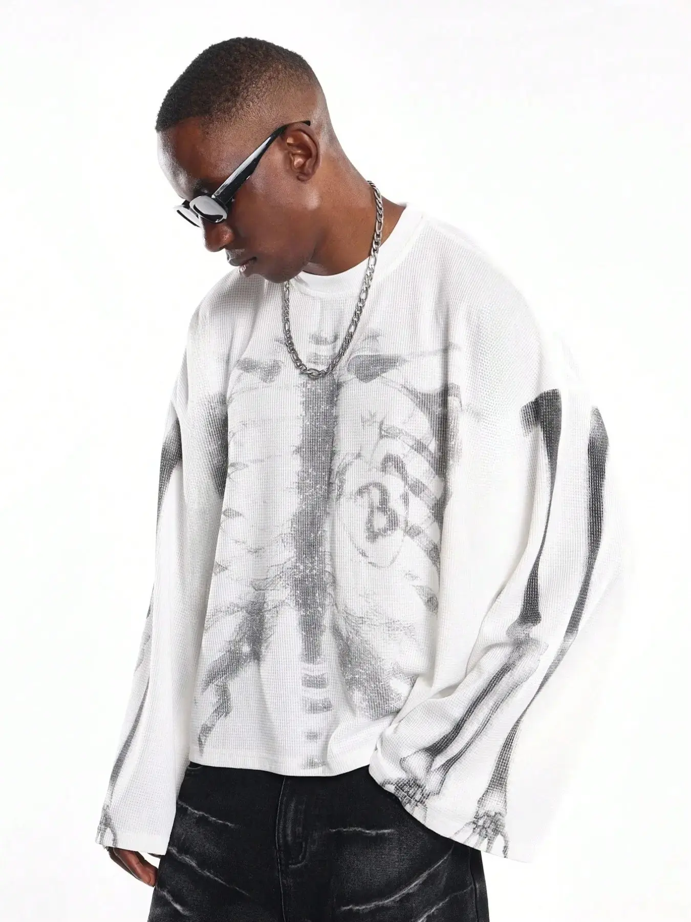 Men's white waffle-knit long-sleeve shirt, Knitwear, skeleton ribcage graphic print, oversized fit, crew neck, drop shoulders, streetwear style, edgy aesthetic, casual daily wear, urban fashion vibe, soft textured fabricGift.