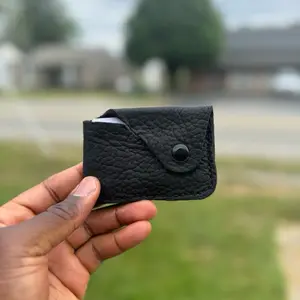 The "Snap" Black Bison Limited Minimal Wallet - Compact Design with Black Button Closure and Black Stitching Detail