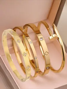 4-piece set of classic, fashionable and luxurious stainless steel bracelets, a daily fashion item, perfect for daily wear, holiday gatherings, and perfect gifts