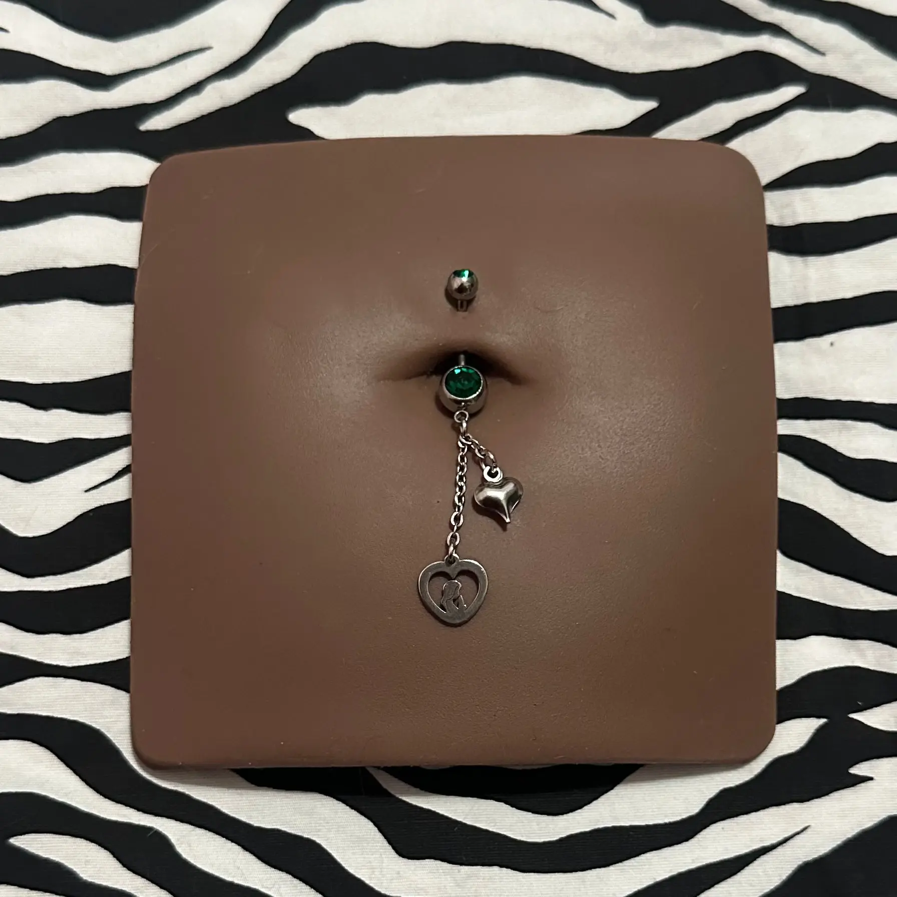 Virgencita Belly Piercing