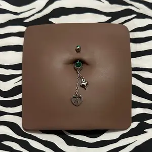 Virgencita Belly Piercing