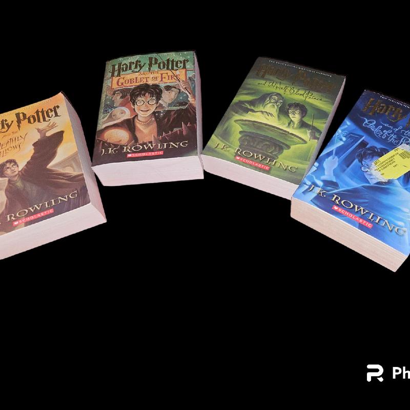 Partial Collection of Harry Potter books includes 4 of the soft cover books. See photo for titles of the books that are included. Collector's Edition Soft Cover