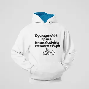 Eye muscles gains  from dodging camera traps– Funny Unisex Graphic Hoodie – Streetwear Fit for Casual Wear & Everyday Outings