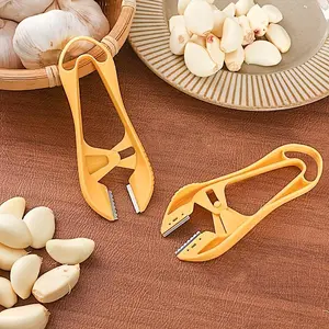 The Garlic Peeler Is a Dual-Purpose Tool Suitable for Both Home And Commercial Use, Designed to Easily Remove The Skin And Clean Garlic Cloves