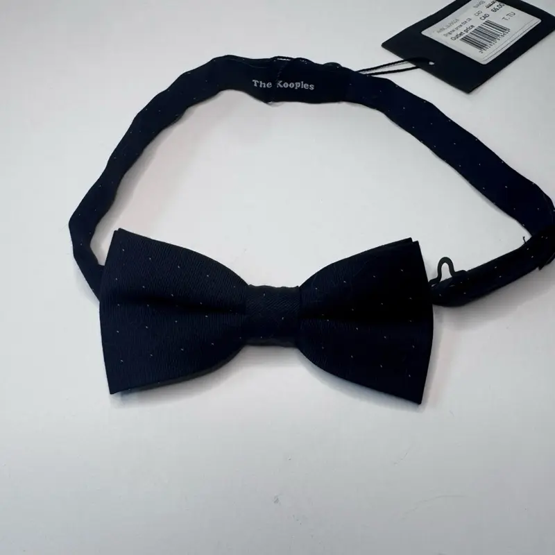 The Kooples brand black bow tie featuring a subtle white polka dot pattern