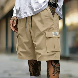 Men’s summer shorts with elastic waistband and drawstring, large pockets, multifunctional casual five-inch inseam shorts; outdoor sports shorts; men’s cargo shorts with letter patches and flap pockets.