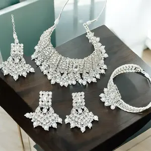 Exquisite Handcrafted Bridal Suite Intricate Clear-Stone Choker with Delicate Beaded Drops and Matching Maang Tikka Set