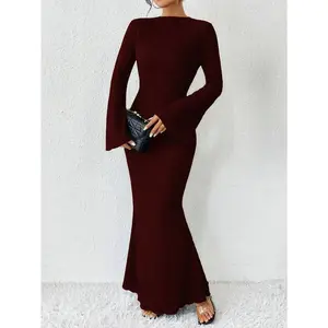Elegant solid long-sleeve maxi dress for women featuring a stand collar, ribbed knit fabric, mermaid hem, and bell sleeves; slim fit suitable for fall, winter, and spring; minimalist chic evening outfit for parties, dinners, events, and everyday wear.