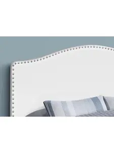 HomeRoots Adjustable Upholstered Queen Headboard - White Faux Leather, Arched Shape, Nailhead Trim, Adjustable Height, with Legs, Adjustable Upholstered Headboard