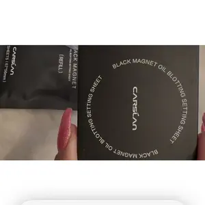 Product Review of CARSLAN Black Magnet Oil Blotting Setting Sheet With Powder More Control Oil Keep Fresh 2 IN 1 Blotting Sheet with Mirror Puff & Recyclable Case 450 Sheets 1 Box 2 Refills from M**a G**🏝