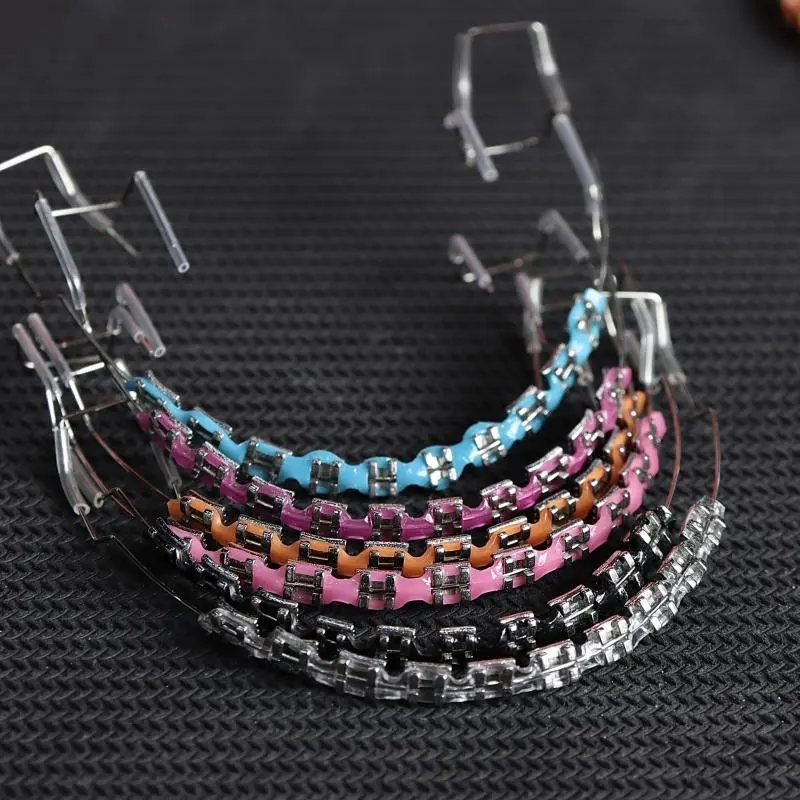 Fashionable colorful upper and lower teeth metal bracket dental decoration set with hook and storage box trendy dental petal combination jewelry for daily wear party accessories