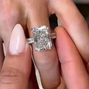 Radiant cut eternity band ring, sizing bar, donut, pavé underside