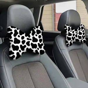 A black and white cow print car headrest, Car Seat Attachment, a neck and lumbar support integrated pillow, Breathable Neck Cushion, soft, fluffy, and breathable, suitable for all seasons, ideal for long drives, power naps, and various other scenarios.