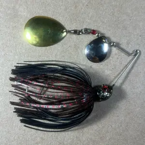 Custom Bingo Spinnerbait, 1/2oz Back Neon & Dark Melon Red Scales Double Colorado Nickel/Gold Blades with Brass Base, 80-Strand Tournament-Grade ProUmbrella Skirt, Hand-Crafted Premium Components in Texas, USA.