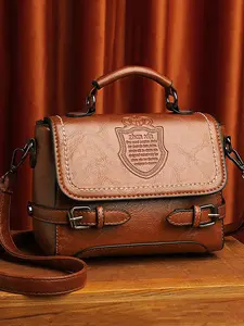 Fashionable retro classic versatile postman bag, a refined and practical handbag with shield embossed decoration, capable of holding a phone and keys, suitable for daily commuting, shopping, and gatherings