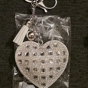 Heart-Shaped Keychain with Rhinestone Accents and Tassel Charm for Stylish Accessory