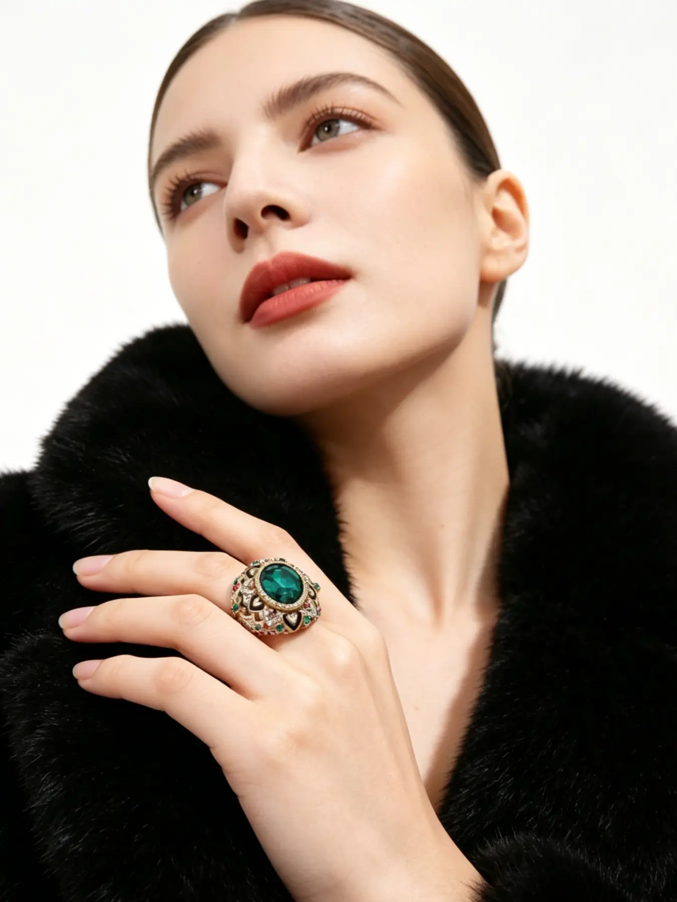 A vintage antique gold court style ring, featuring large emerald as the main stone, paired with colorful gemstones and enamel carvings, suitable for dinners, parties, or vintage outfits.
