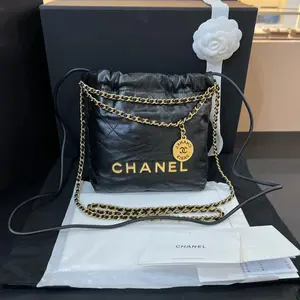 Pre-owned CHANEL microchip Shiny Black Calfskin Quilted Mini 22 Bag Antique Gold Hardware