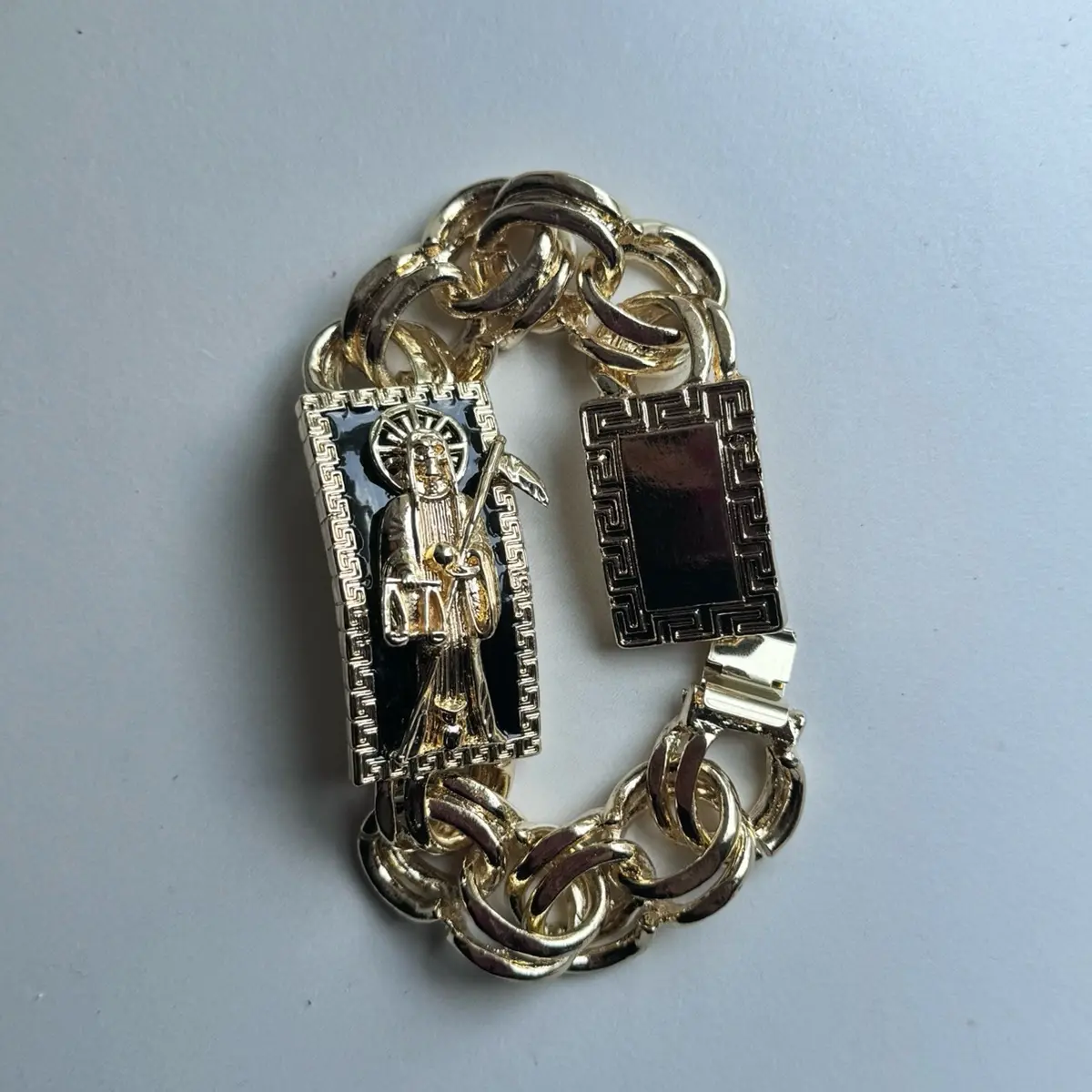 Santa Muerte Chino Cuban Link Greek Esclava with Decorative Elements and Unique Design