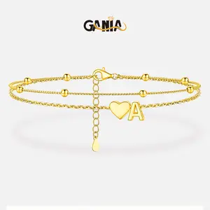 GANIA women's bracelet, made of 18K gold plating. Adjustable size, water-resistant, sweat-proof, color-resistant, sturdy multi-layer heart-shaped chain. Suitable for summer outfits. A-Z series letter bracelet. Fashionable beach accessory.