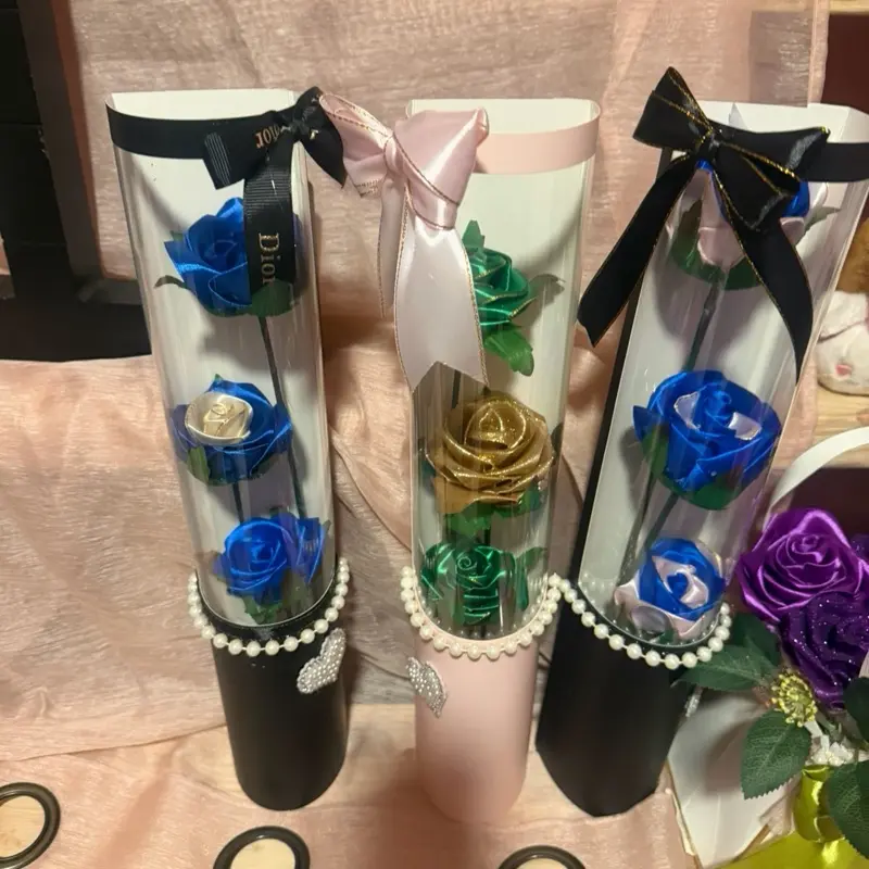 3 Eternal Roses in Elegant Tubes with Pearl Accents and Ribbon Bows 25$