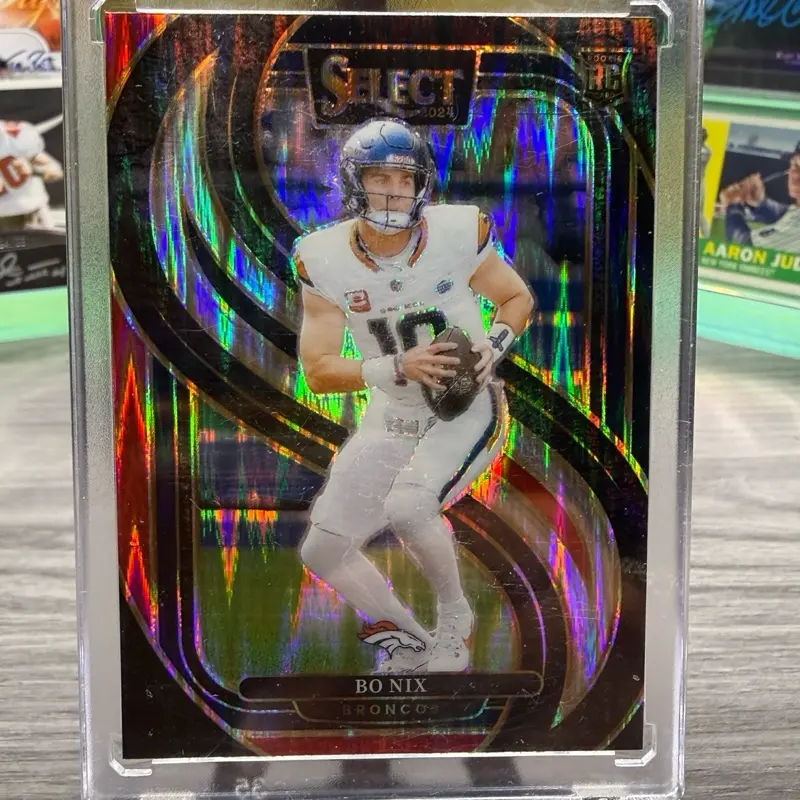 2024 Panini Select Premier Level Bo Nix Black & Red Prizm Shock #117 Denver Broncos Rookie Card
