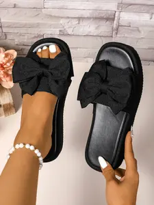 In summer, the new three-dimensional bow decorated with thick-soled wedges with solid colors for ladies sandals is suitable for vacation, commuting and dating Women Footwear
