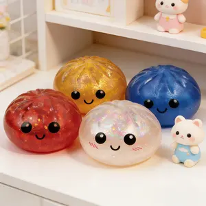 Brand-New Glitter Dumpling Squeeze Toy — A sparkling, dumpling-shaped stress-relief toy that bears a striking resemblance to a realistic steamed bun.
