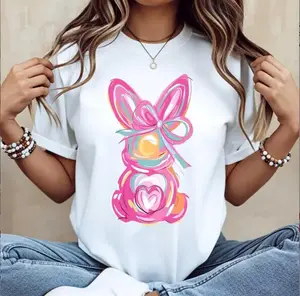 Women Casual Round Neck Short Sleeve T-Shirt White Easter Bunny With Pink Bow And Colorful Swirls Print For Spring Festival And Holiday Wear