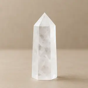 Natural Clear Quartz Single Point – A hand-carved hexagonal tower crystal that serves both as a powerful tool for meditation, energy healing, and spiritual growth, and as an elegant, pure decorative piece for your home.