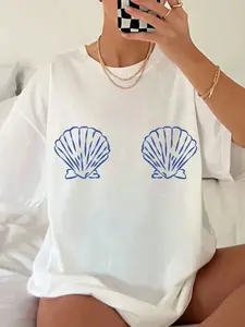 Seashell Print Oversized White T-Shirt, Breathable Cotton Summer Beach Graphic Tee, Coastal Y2K Vacation Casual Top, Soft Lightweight, Mermaidcore Short Sleeve, Round Neck Tee for Women, Boho Tops, Perfect for Beach Trips, Summer Vacations