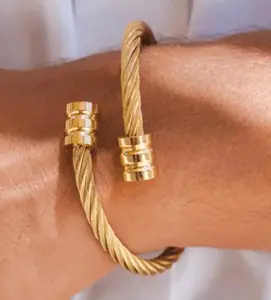 Gold-Tone Twisted Cable Bangle Bracelet for Women Stylish Durable Jewelry Accessory with Gold-Tone Finish and Twisted Cable Design