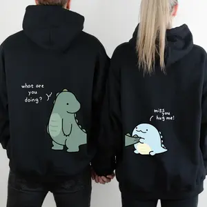 Cute Dinosaur Matching Couple Hoodies – Playful Graphic Sweatshirts, Cozy Gift for Couples-women shirts- Cozy Unisex Casual Wear for Men & Women