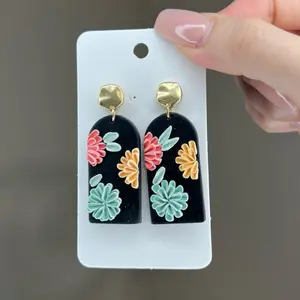 Black floral earrings
