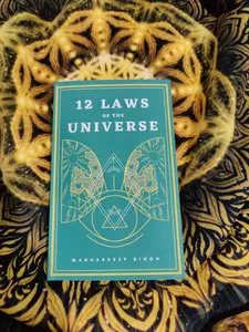 12 Laws of the Universe Paperback