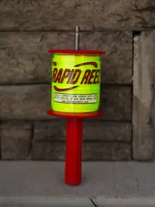 The Rapid Reel attachment for drill or impact for reeling up stringline