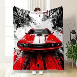 Vibrant American Muscle Car Print Blanket. This eye-catching design features a bold red Dodge Challenger racing through a dynamic black and white urban street, with splatter effects adding a sense