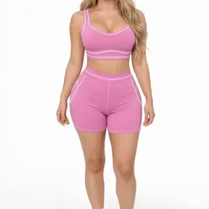 ROSI SET -Sports set featuring a bra with white trim and matching shorts.