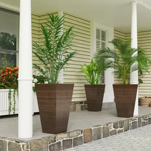 3-Piece Tall Flower Pots – 28" H, Brown. Faux Wood Finish. Self-Draining – Prevents Water Logging. Stackable for Off-Season Storage. 66 lb Weight Capacity