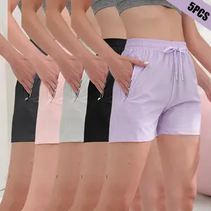 Summer women’s casual athletic shorts—breathable, quick-dry ice silk fabric; elastic drawstring waist; slanted zippered pockets; three-inch inseam length. Suitable for everyday wear, running, fitness, and yoga.