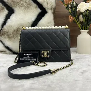 Pre-owned CHANEL black lambskin shoulder shoes with gold buckle and pearl embellishment on top 866