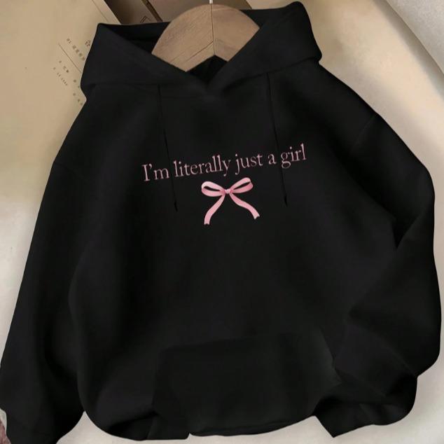 Women's casual hoodie with "I'Literally Just A" print and pink bow detail - comfortable black pullover with pockets, perfect for everyday fall and winter wear | Playful and stylish hoodie | Soft texture hoodie, women's hoodie