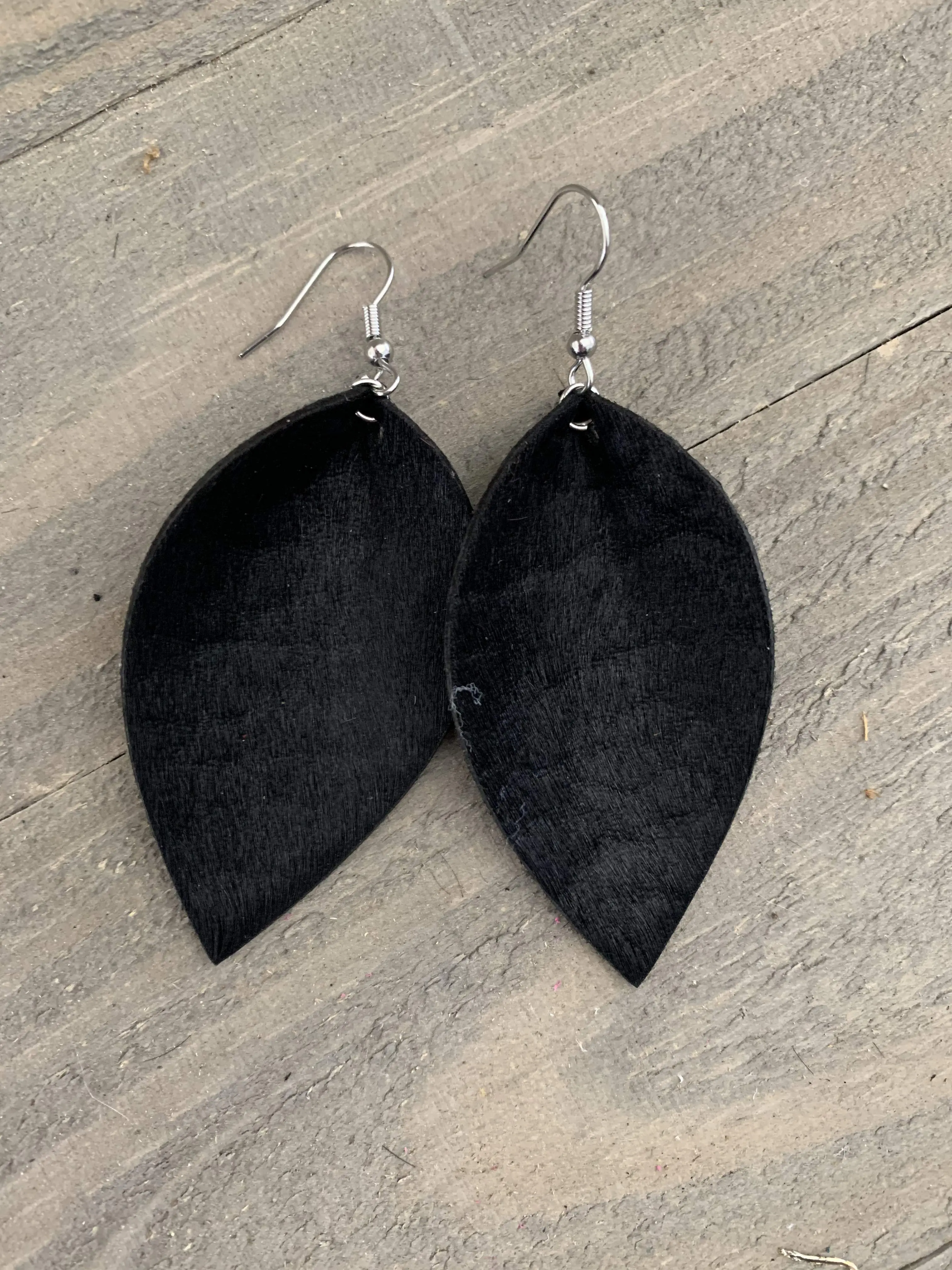 Black hair on leather earring