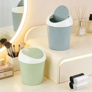 KUAOOAUK 2-piece set of plastic mini trash cans, comes with 4 rolls of trash bags, small trash basket with a rotating lid, small desktop trash bin, suitable for home, office, kitchen, dressing table, bedroom, bathroom (blue + green)
