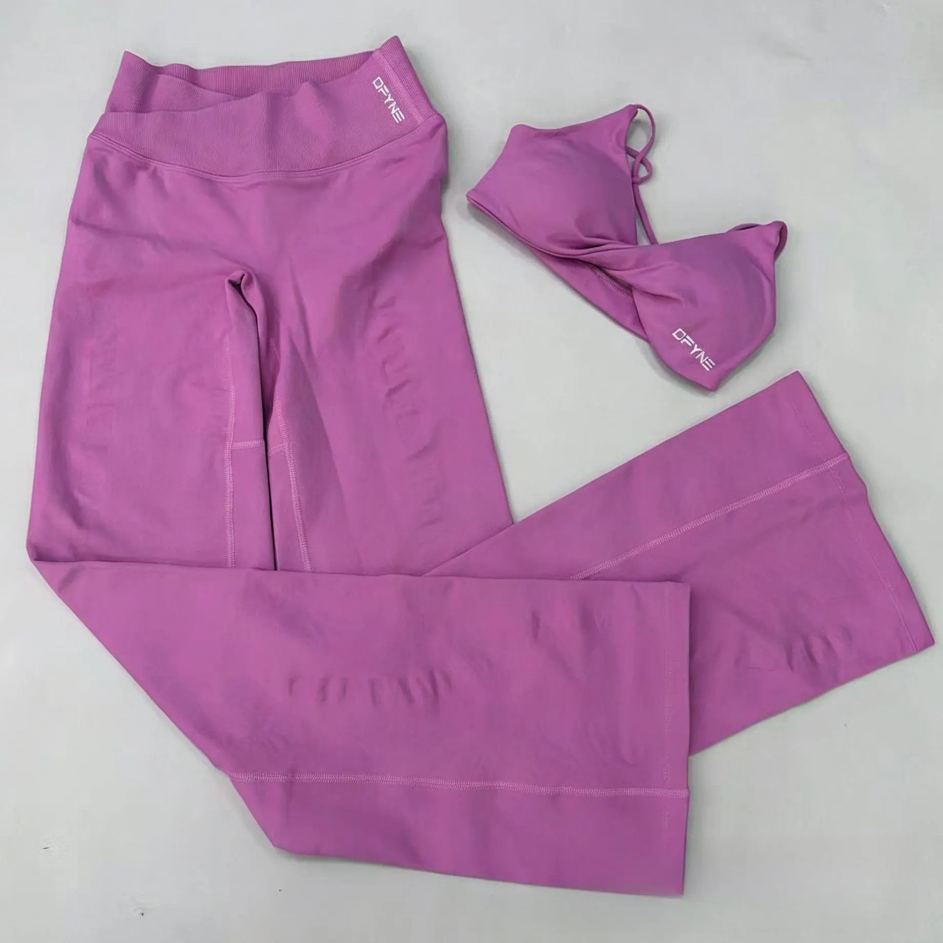 DFYNE 2-Piece Cross Waist Flare Leggings Set • Twist Front Sports Bra & High Waisted Yoga Pants • Seamless Workout Outfit Bundle