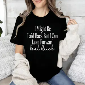 Unisex Crew Neck T-shirt, with Bold Cursive Prints Of White Text On The Front: "I Might, " "Leisurely But I Can, " "Lean Forward Quickly, " And "Really Fast."
