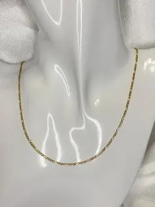 Elegante cadena estilo figaro semisolida , en oro 10k